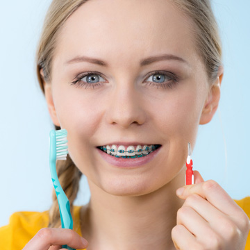 cleaning teeth with braces